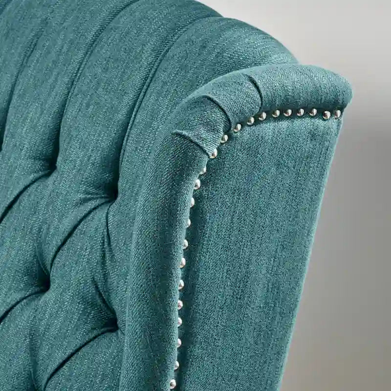 Sillón decorativo de tela vintage con respaldo alto y capitoné