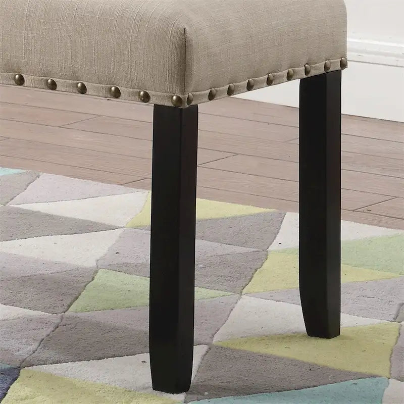Banc de salle à manger en tissu avec bordure cloutée et structure en bois